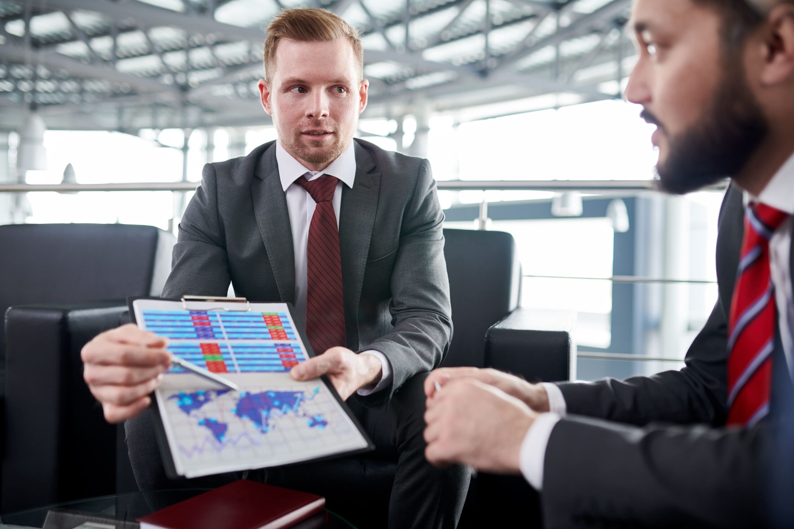 business-meeting-with-data-presentation-in-bright-2026-01-09-00-55-28-utc