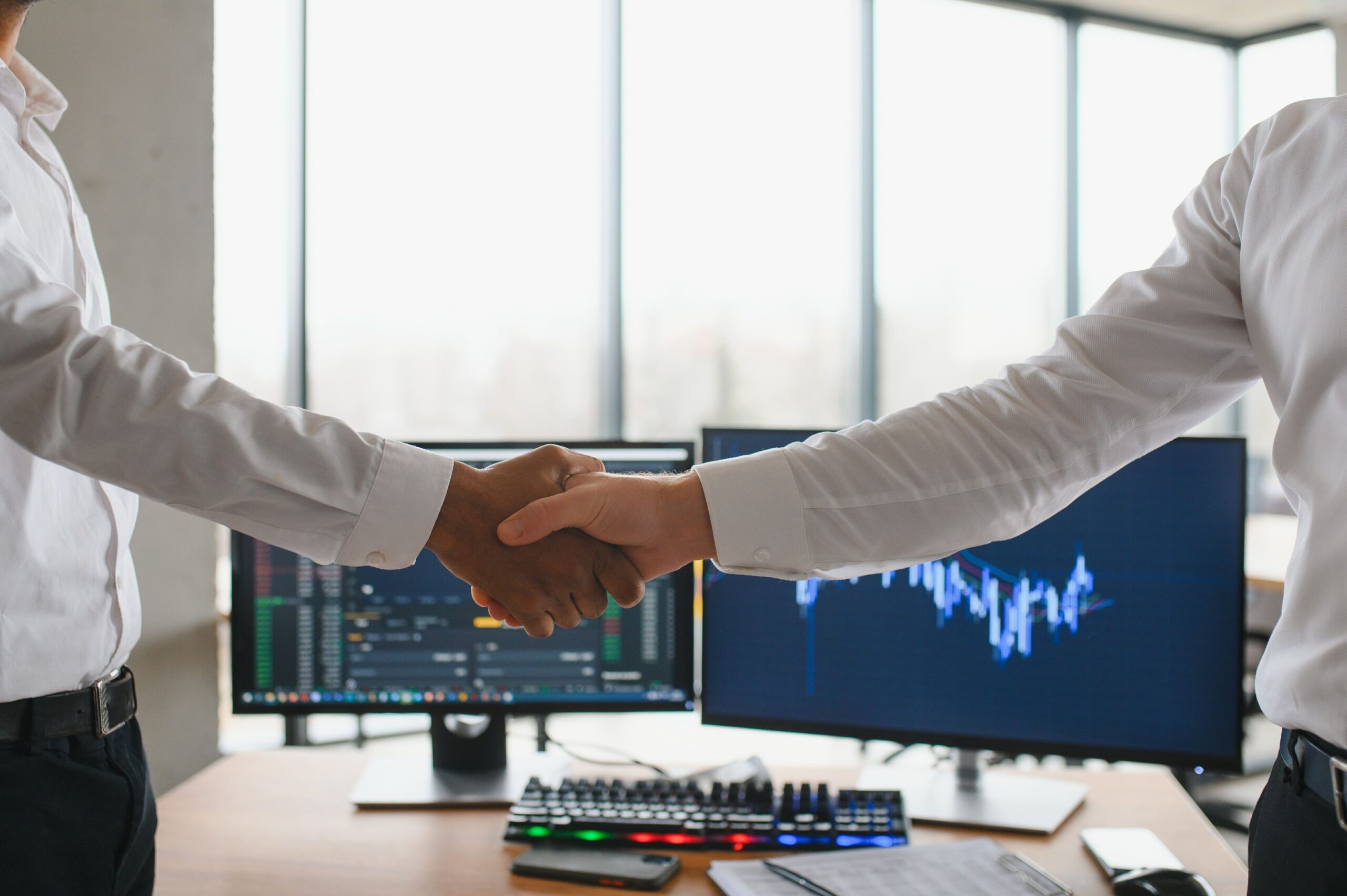 business-professionals-handshake-agreement-in-mode-2026-01-08-22-18-01-utc